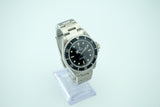 Rolex - Submariner "w/ Papers" Ref. 14060M