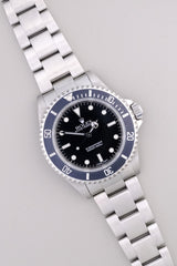 Rolex - Submariner "w/ Papers" Ref. 14060M