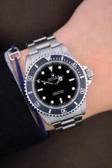 Rolex - Submariner "w/ Papers" Ref. 14060M